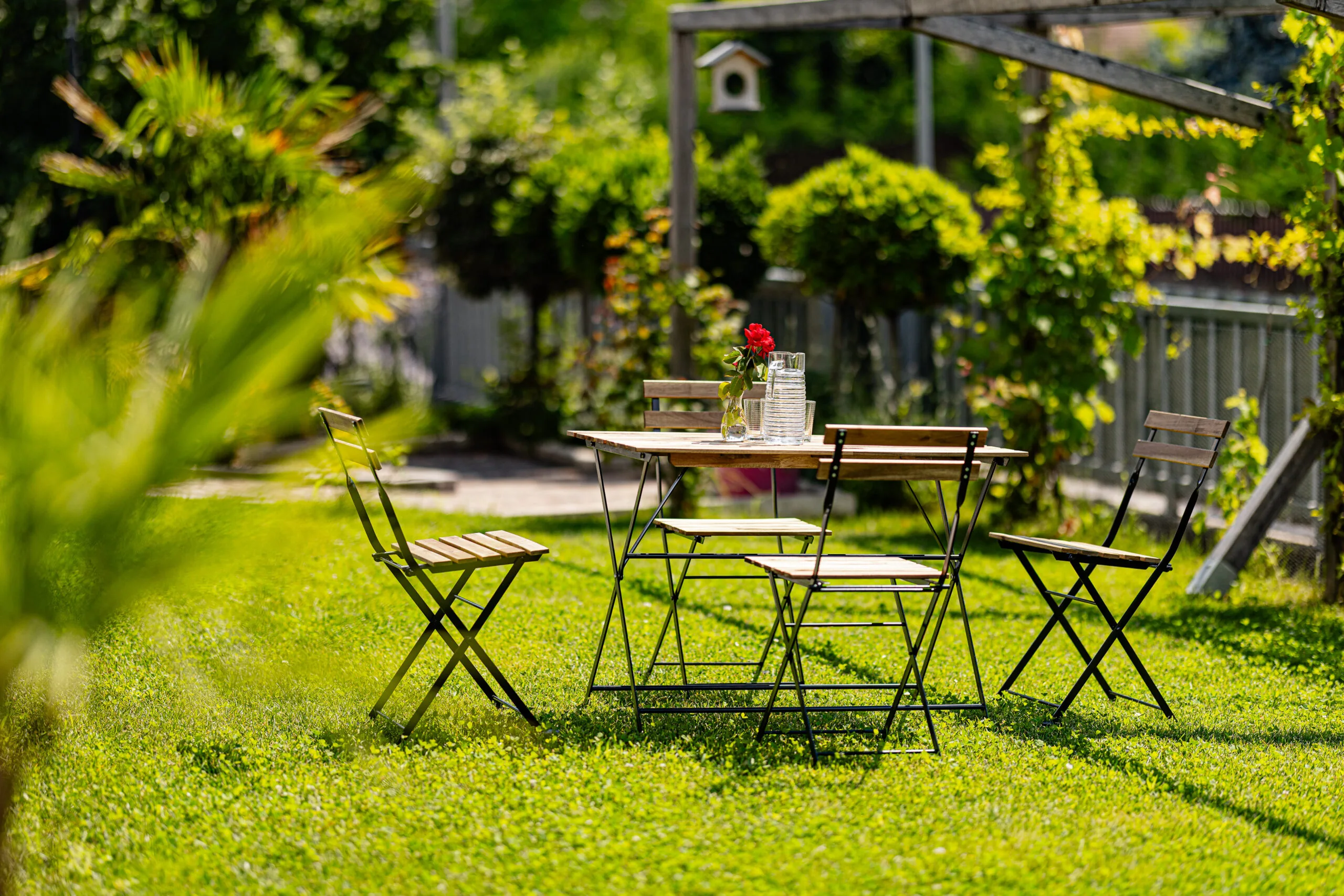 Private outdoor area with table and chairs